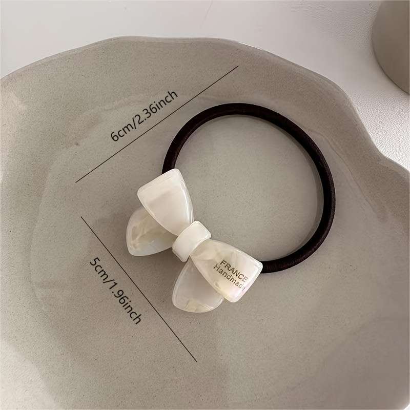 Bow-decorated hair band