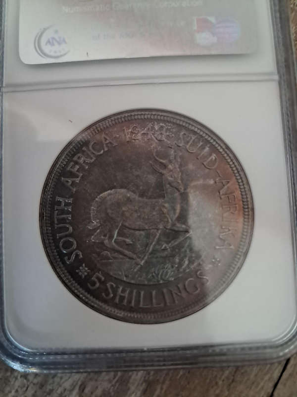 1948 5 Shillings. Very highly graded by the NGC. PF67!