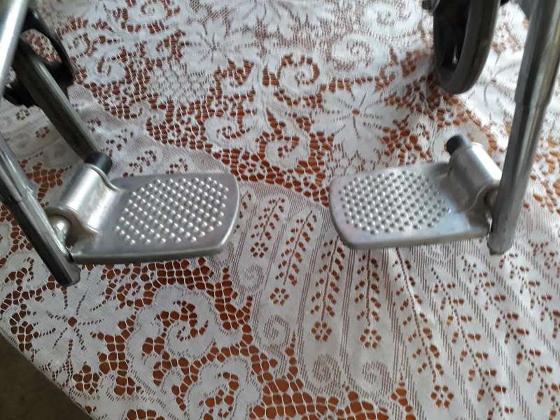 WHEELCHAIR - 100% WORKING CONDITION VERY HEAVY FOR A SMALL TO MEDIUM SIZED PERSON ONLY.