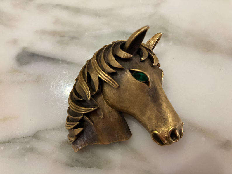 VINTAGE 1960'S TRIFARRI LOOK A LIKE HORSE HEAD BROOCH WITH BLUE RHINESTONE EYES