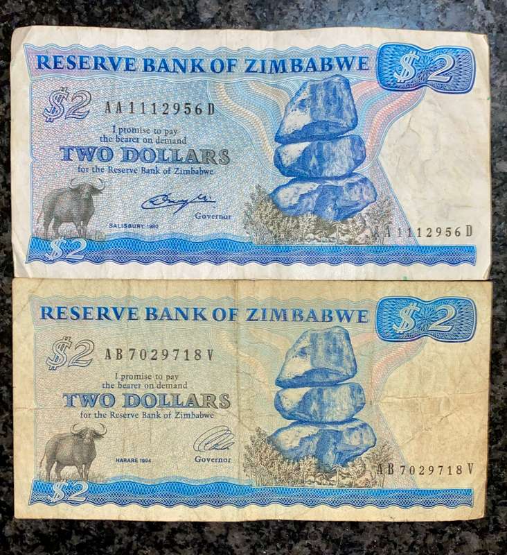 Zimbabwe. set 2 dollars two different wtm 1980/1994 (1 bid takes all)