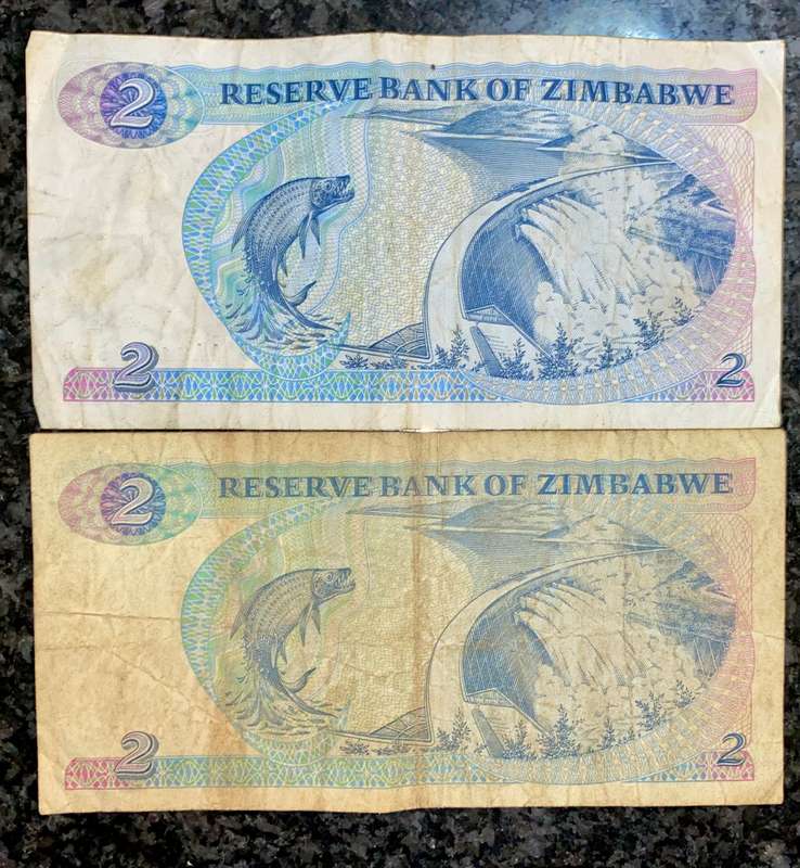 Zimbabwe. set 2 dollars two different wtm 1980/1994 (1 bid takes all)
