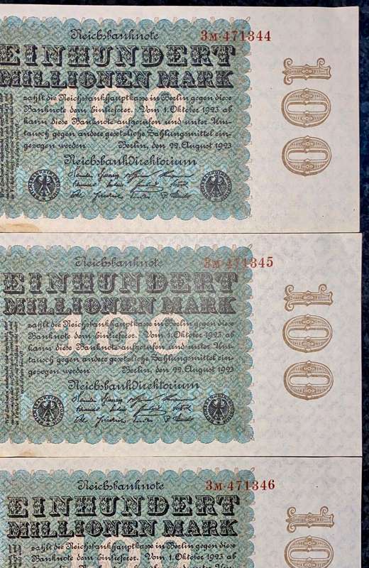 Germany. 100 million mark in sequence 471344-346 aunc 1923 (1 bid takes all)