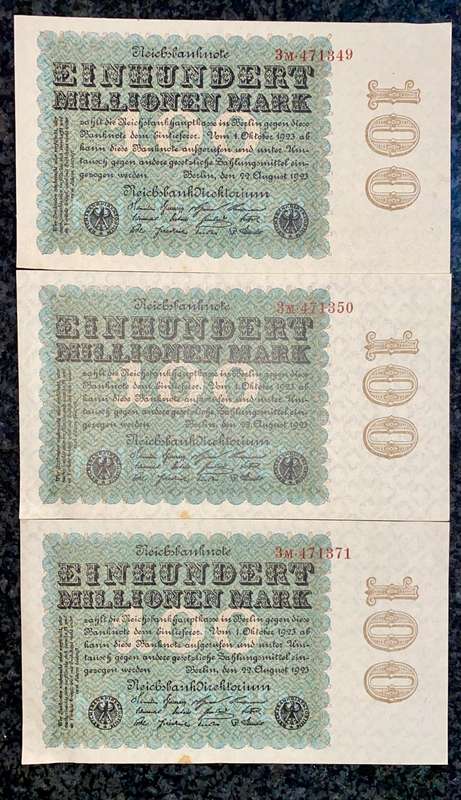 Germany. 100 million mark in sequence 471350-349 & 371 aunc 1923 (1 bid takes all)