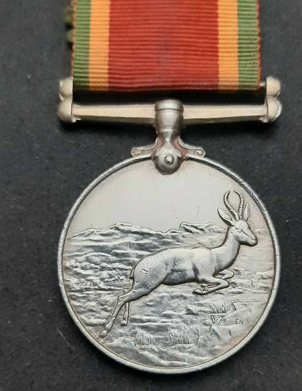**WW2: UDF .925 Silver Africa Service Medal w/ Ribbon ( Att. Female).**