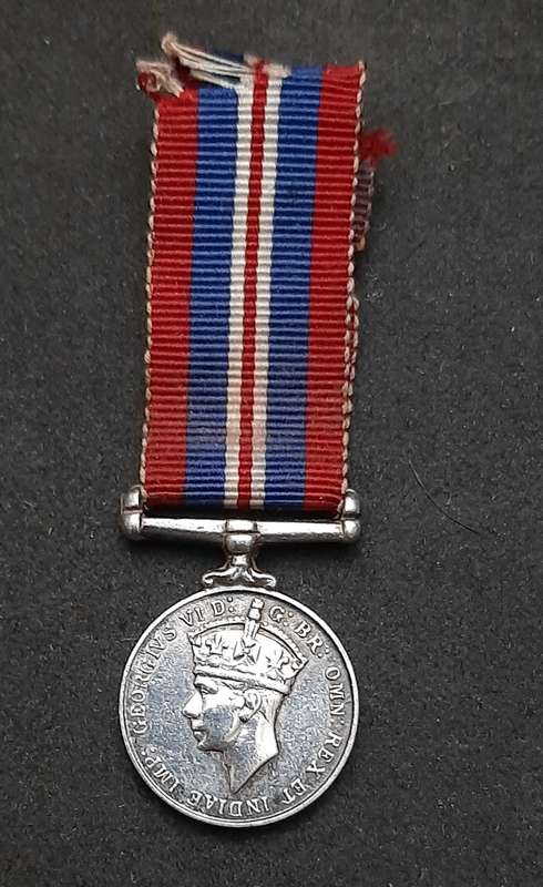 **WW2: .925 Silver Miniature British War Medal w/ Ribbon.**