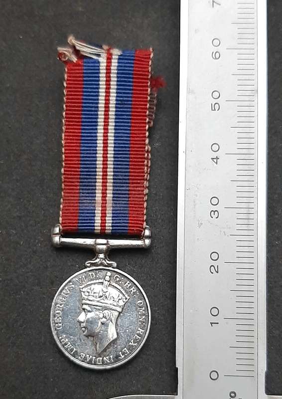 **WW2: .925 Silver Miniature British War Medal w/ Ribbon.**