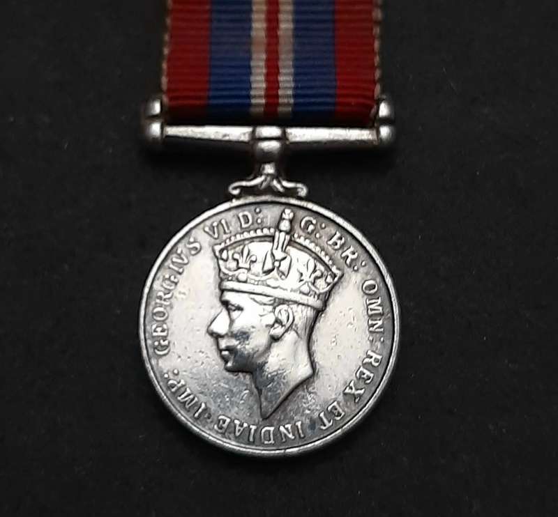 **WW2: .925 Silver Miniature British War Medal w/ Ribbon.**