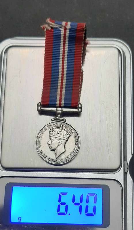 **WW2: .925 Silver Miniature British War Medal w/ Ribbon.**