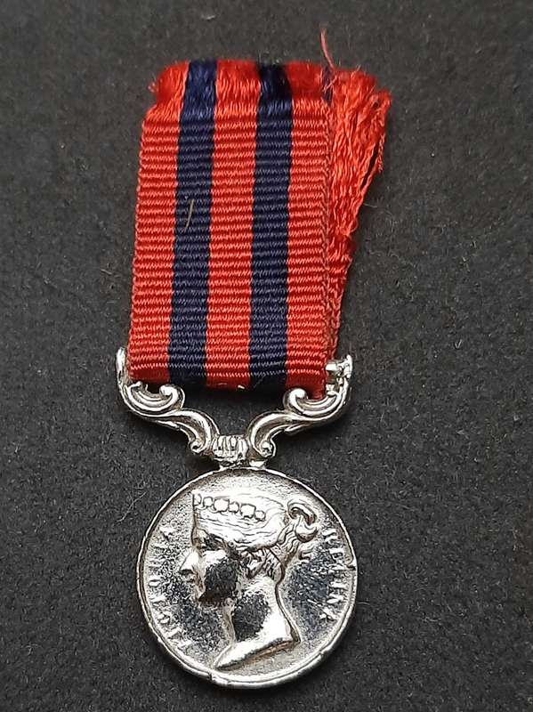 **British Army: Repro. QV 1854 India General Service Miniature Medal w/ Ribbon.**