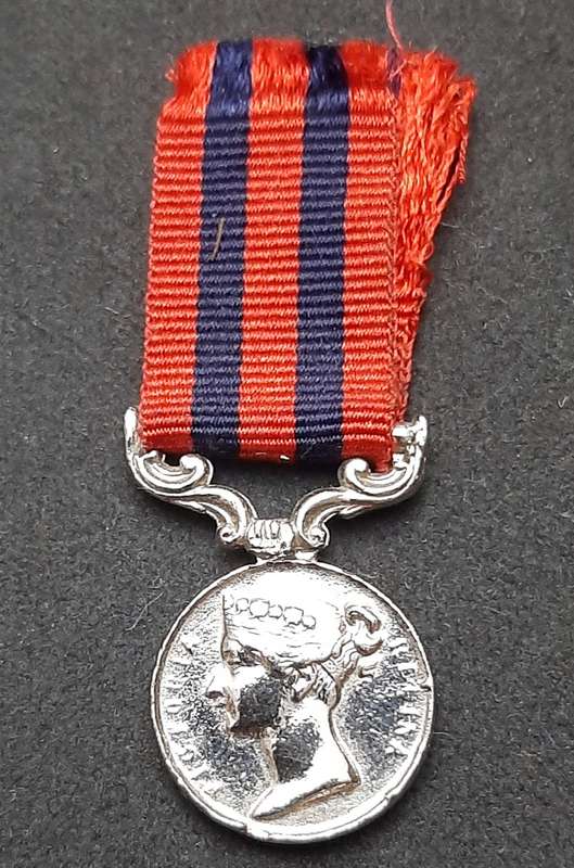 **British Army: Repro. QV 1854 India General Service Miniature Medal w/ Ribbon.**