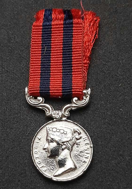 **British Army: Repro. QV 1854 India General Service Miniature Medal w/ Ribbon.**