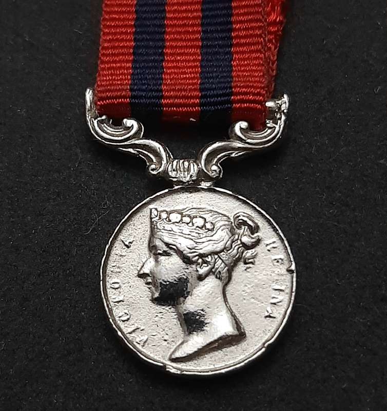 **British Army: Repro. QV 1854 India General Service Miniature Medal w/ Ribbon.**