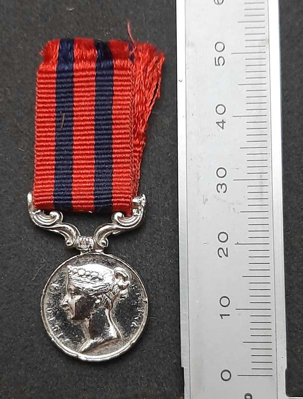 **British Army: Repro. QV 1854 India General Service Miniature Medal w/ Ribbon.**