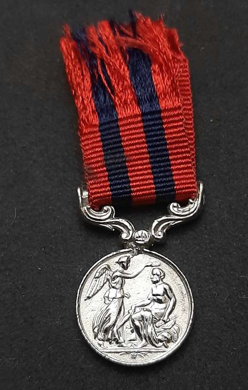 **British Army: Repro. QV 1854 India General Service Miniature Medal w/ Ribbon.**