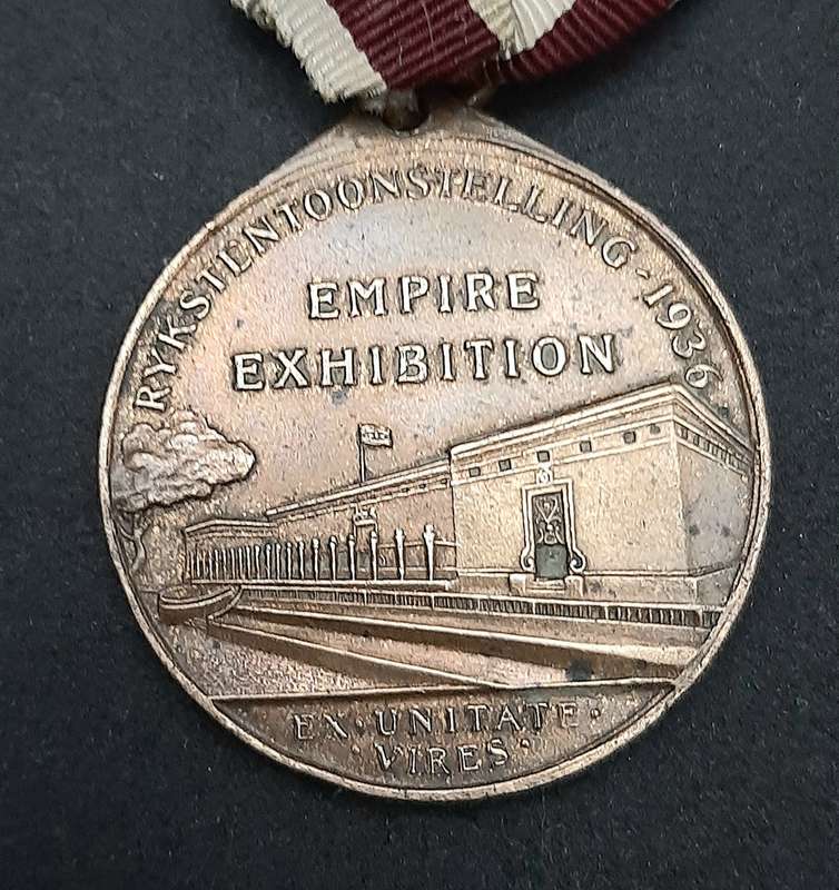 **1936 South Africa : Empire Exhibition Bronze Medallion w/ Silk Ribbon EF. (Pin Intact).**