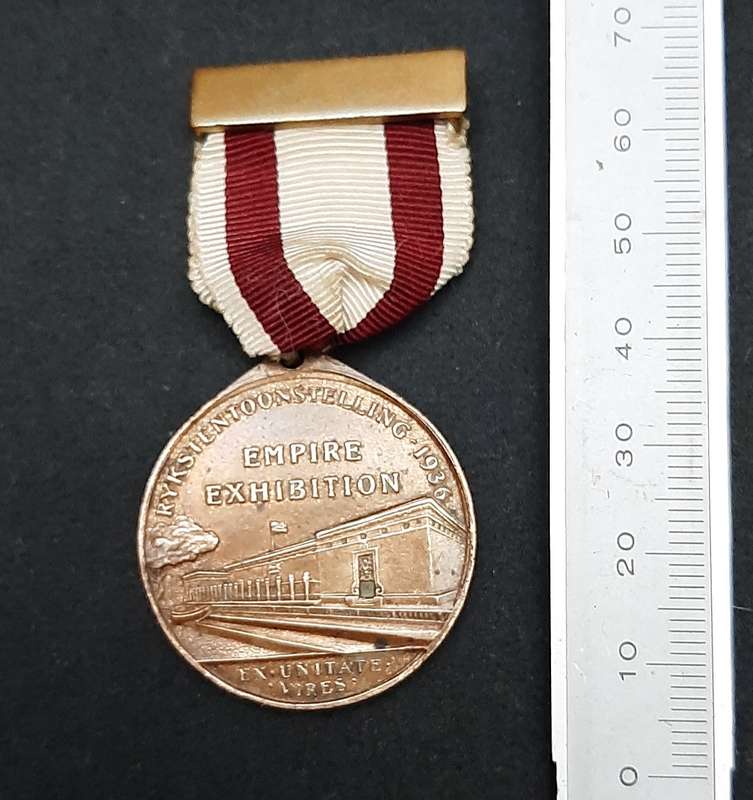 **1936 South Africa : Empire Exhibition Bronze Medallion w/ Silk Ribbon EF. (Pin Intact).**