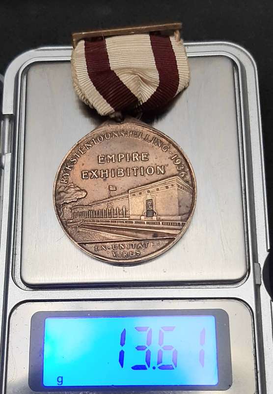 **1936 South Africa : Empire Exhibition Bronze Medallion w/ Silk Ribbon EF. (Pin Intact).**