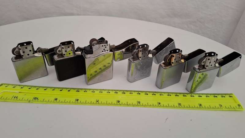 Collection of six Zippo lighters
