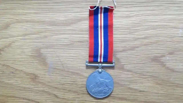 United Kingdom War Medal 1939-1945 Issued To 118034 P.G. Haasbroek - Good Condition