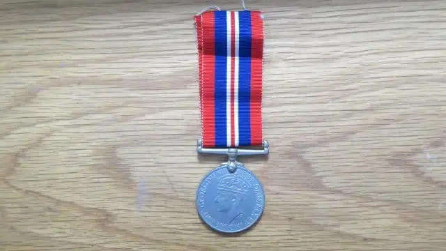 United Kingdom War Medal 1939-1945 Issued To 118034 P.G. Haasbroek - Good Condition