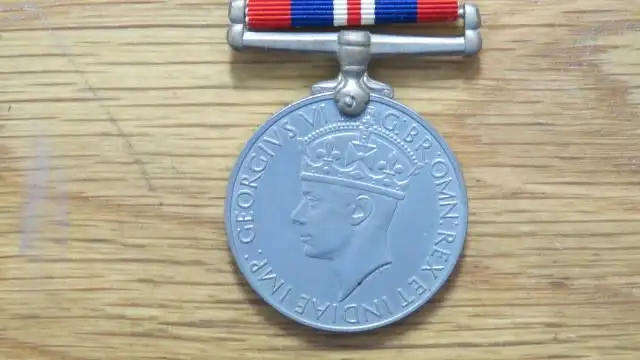 United Kingdom War Medal 1939-1945 Issued To 118034 P.G. Haasbroek - Good Condition