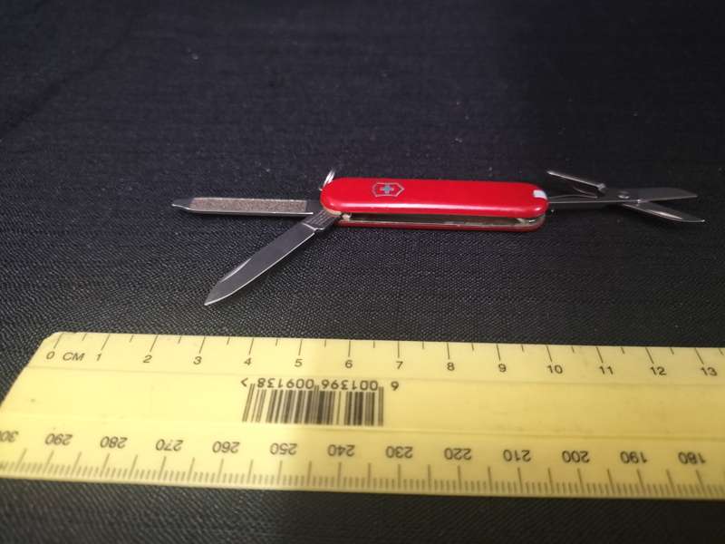 Victorinox Switzerland Stainless Steel Function Transparent Red Pocket Knife  - In Good Condition