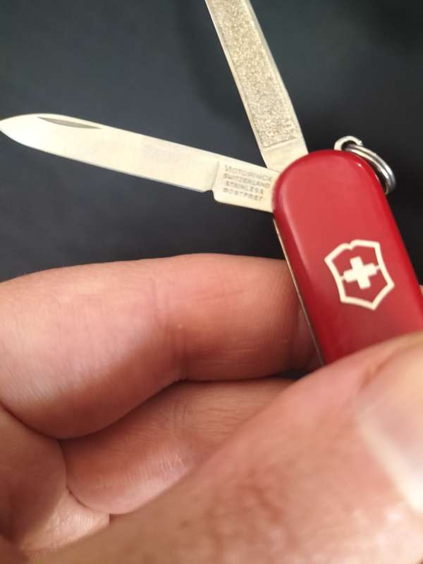 Victorinox Switzerland Stainless Steel Function Transparent Red Pocket Knife  - In Good Condition
