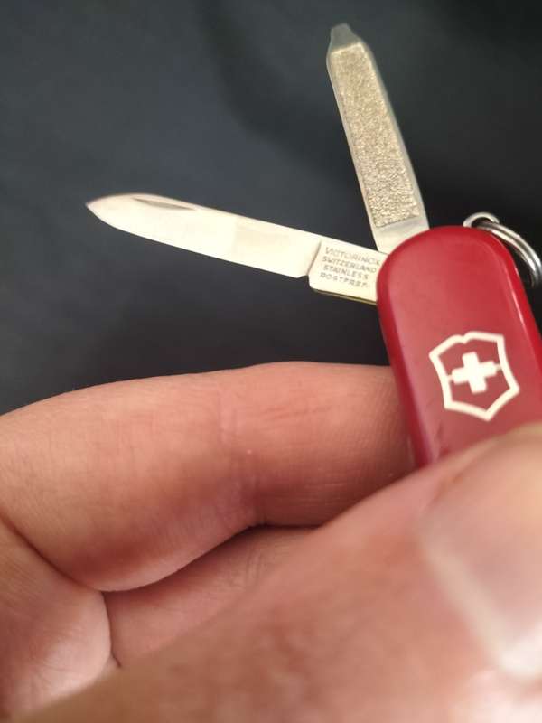 Victorinox Switzerland Stainless Steel Function Transparent Red Pocket Knife  - In Good Condition