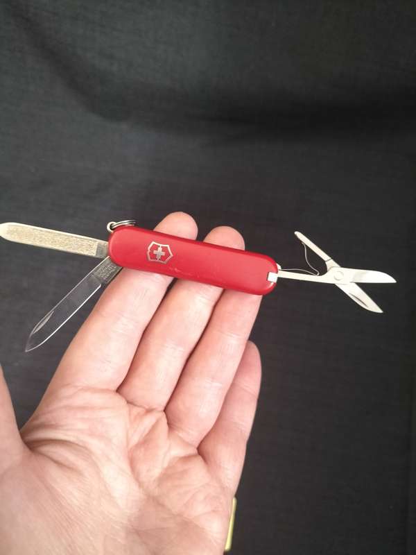 Victorinox Switzerland Stainless Steel Function Transparent Red Pocket Knife  - In Good Condition