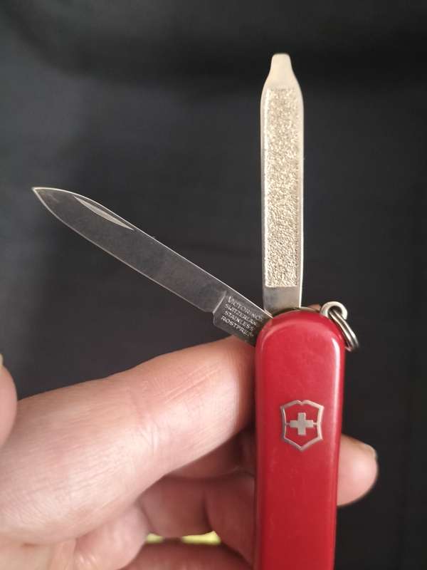 Victorinox Switzerland Stainless Steel Function Transparent Red Pocket Knife  - In Good Condition