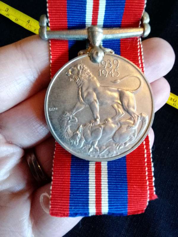 United Kingdom War Medal 1939-1945 Issued To 118034 P.G. Haasbroek - Good Condition