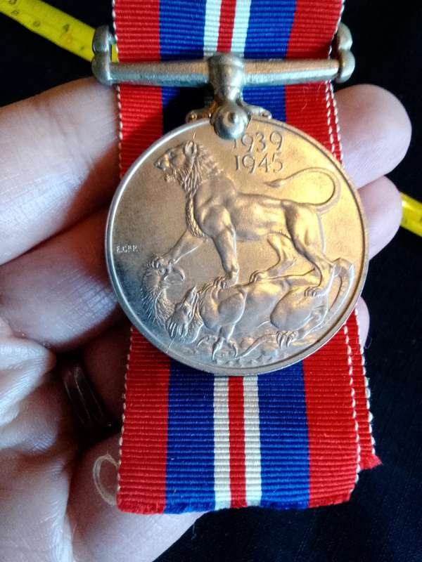 United Kingdom War Medal 1939-1945 Issued To 118034 P.G. Haasbroek - Good Condition