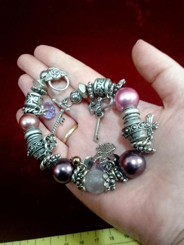 Beautiful Silver Tone Bracelet With Charms And Metal lined Beads Purple and Pink-Excellent Condition