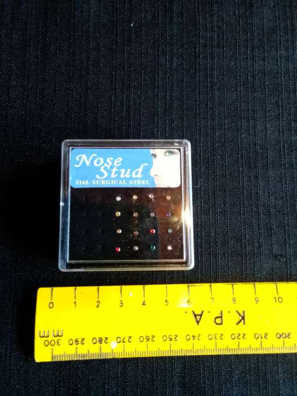 Collection of Twentyfour Nose Studs - 31 L Surgical Steel - Good Condition