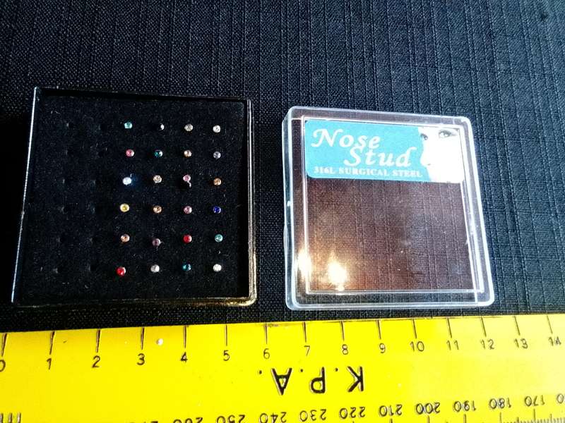 Collection of Twentyfour Nose Studs - 31 L Surgical Steel - Good Condition