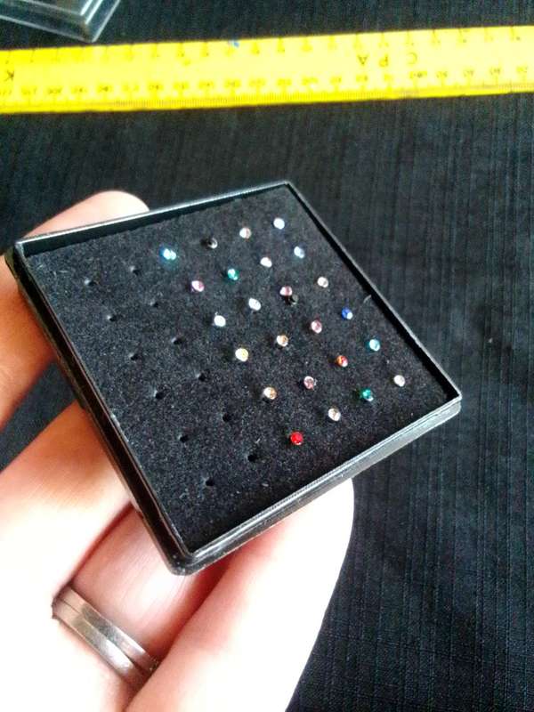 Collection of Twentyfour Nose Studs - 31 L Surgical Steel - Good Condition