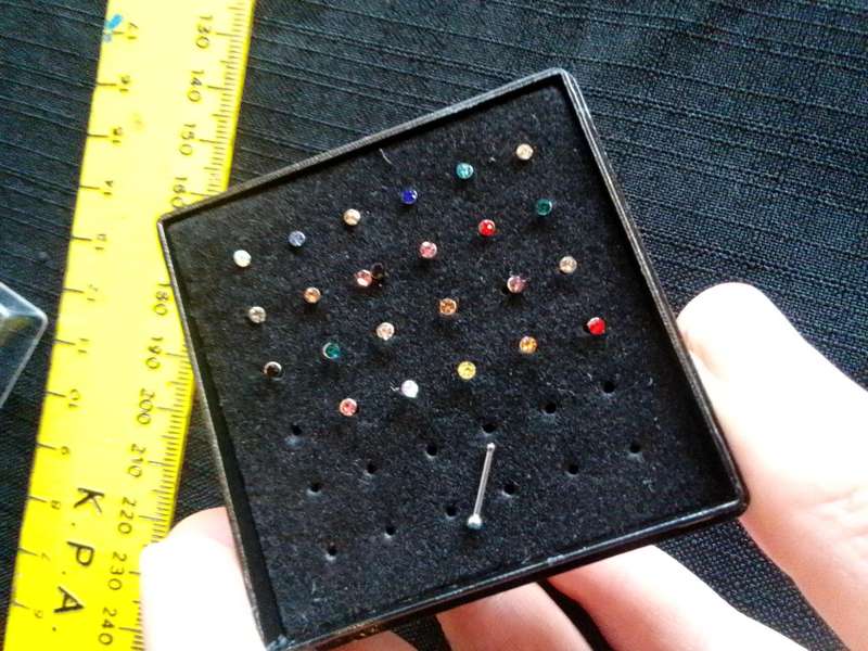 Collection of Twentyfour Nose Studs - 31 L Surgical Steel - Good Condition