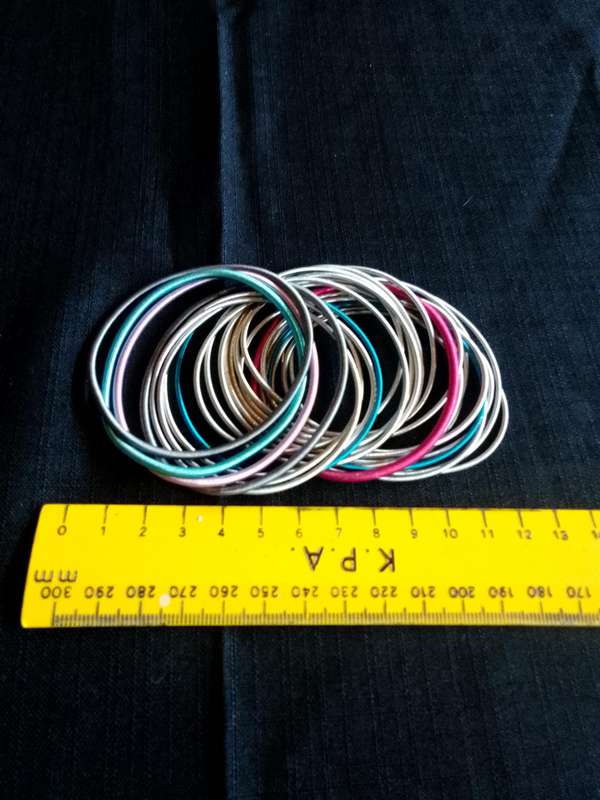 Stunning TwentyFive Silver, Pink And Blue Metal Slinky Spring Arm Bracelets   - Excellent Condition