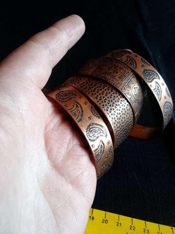 Beautiful Collection Of Seven Engraved Copper Coloured Bangles - Excellent Condition