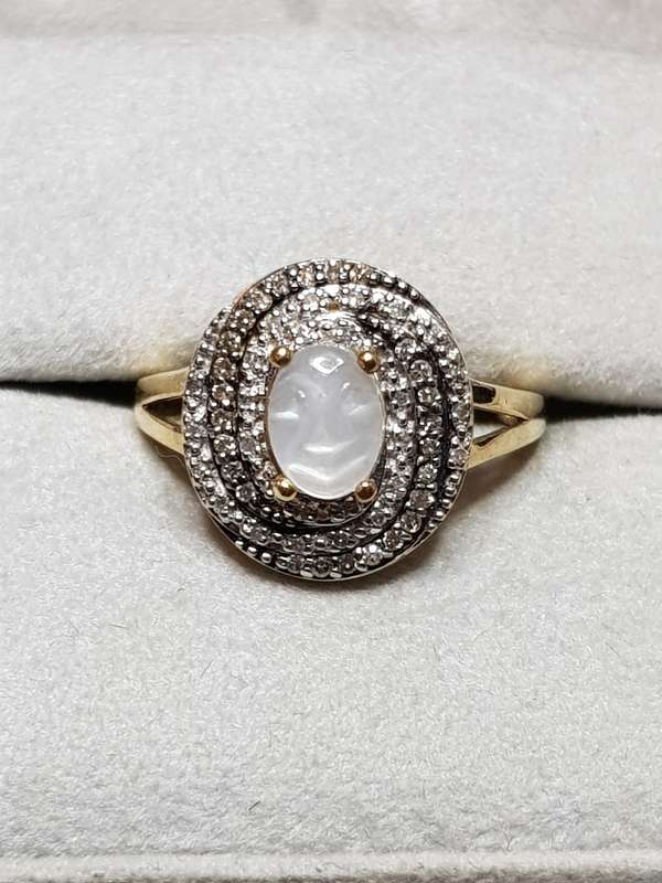 10ct Yellow Gold Carved Man in the Moon Moonstone and Diamond Swirl Ring