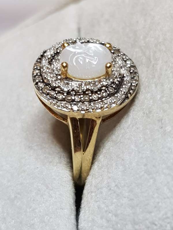 10ct Yellow Gold Carved Man in the Moon Moonstone and Diamond Swirl Ring