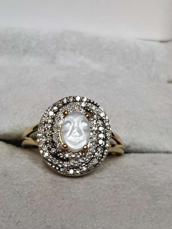 10ct Yellow Gold Carved Man in the Moon Moonstone and Diamond Swirl Ring