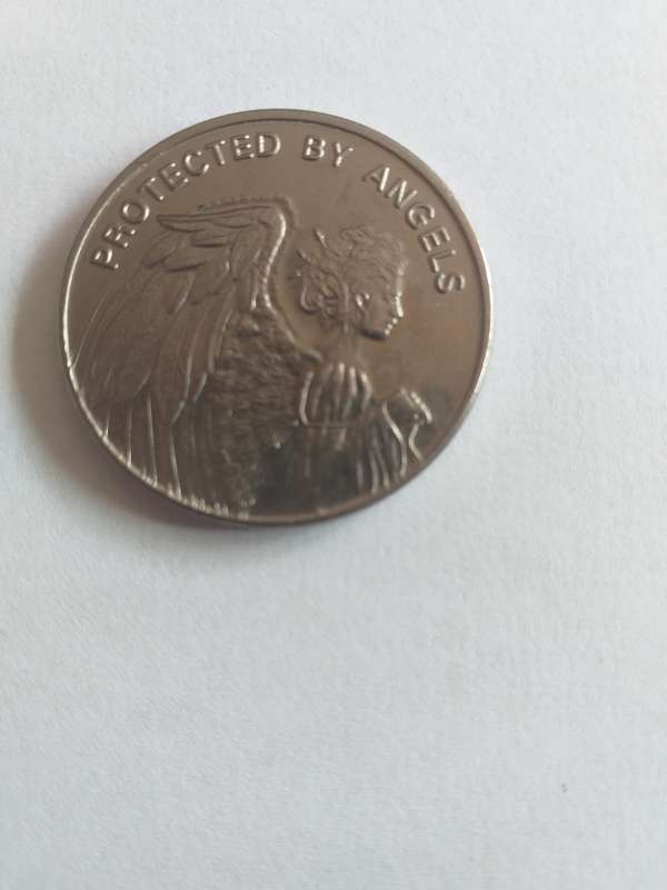 U.S.A. army in god we trust coin