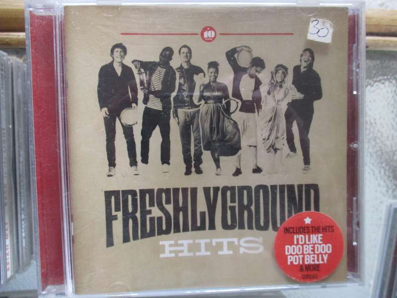 freshly ground cd autographed by zolani
