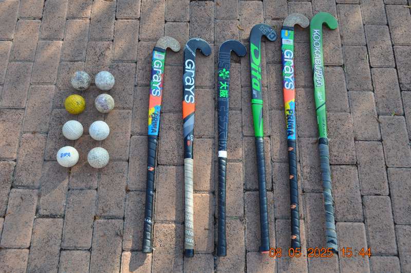 Hockey Sticks and Practice Balls Take Them All