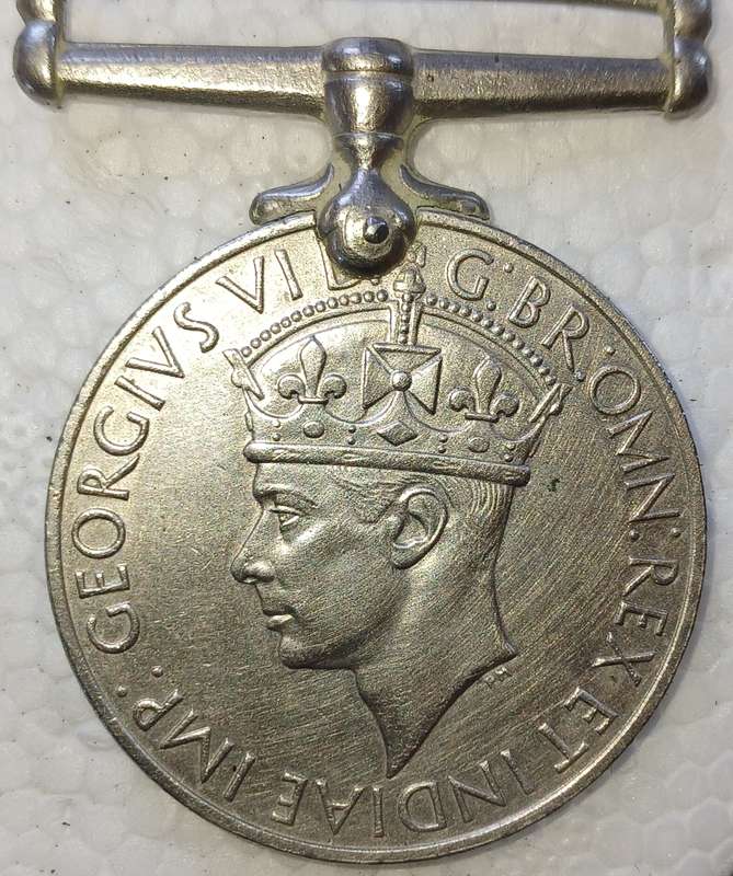 WW2 Engraved George VI War Medal 104763 B.H. Fourie