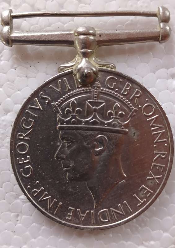 WW2 Engraved George VI War Medal 104763 B.H. Fourie