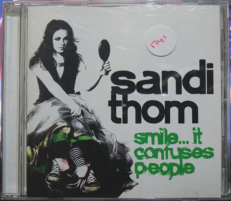 SANDI THOM smile... it confuses people
