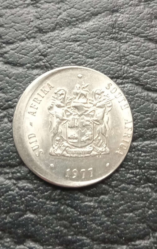 1977 R1 coin, damaged during minting